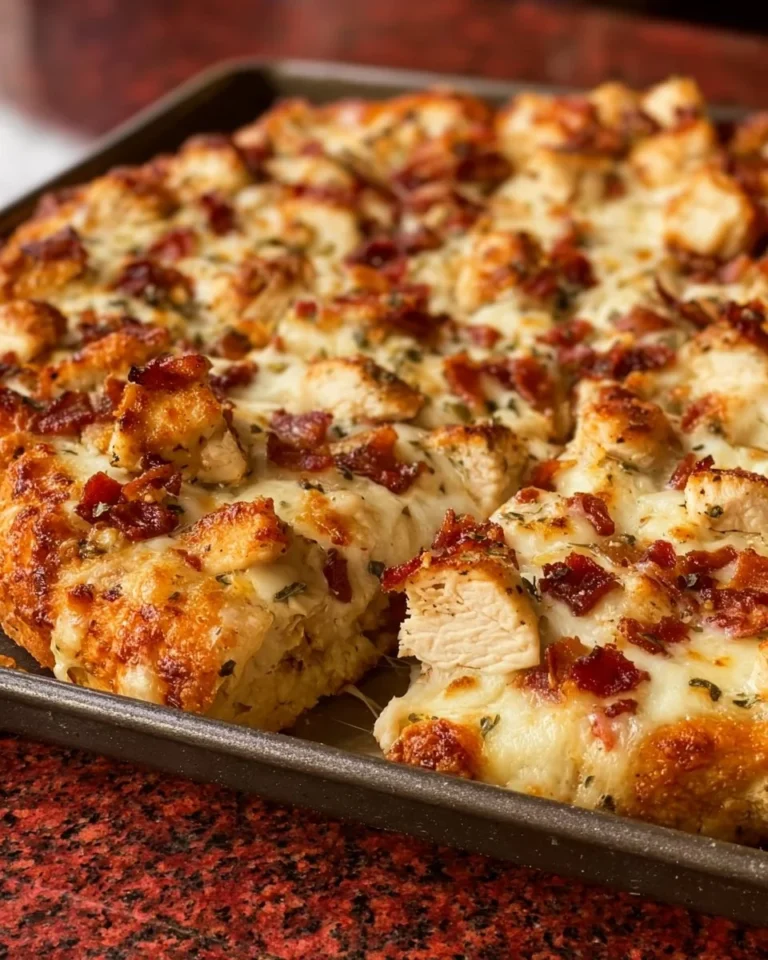 Delicious Chicken Alfredo Pizza on Cheddar Bay Biscuit Crust ready to be served.