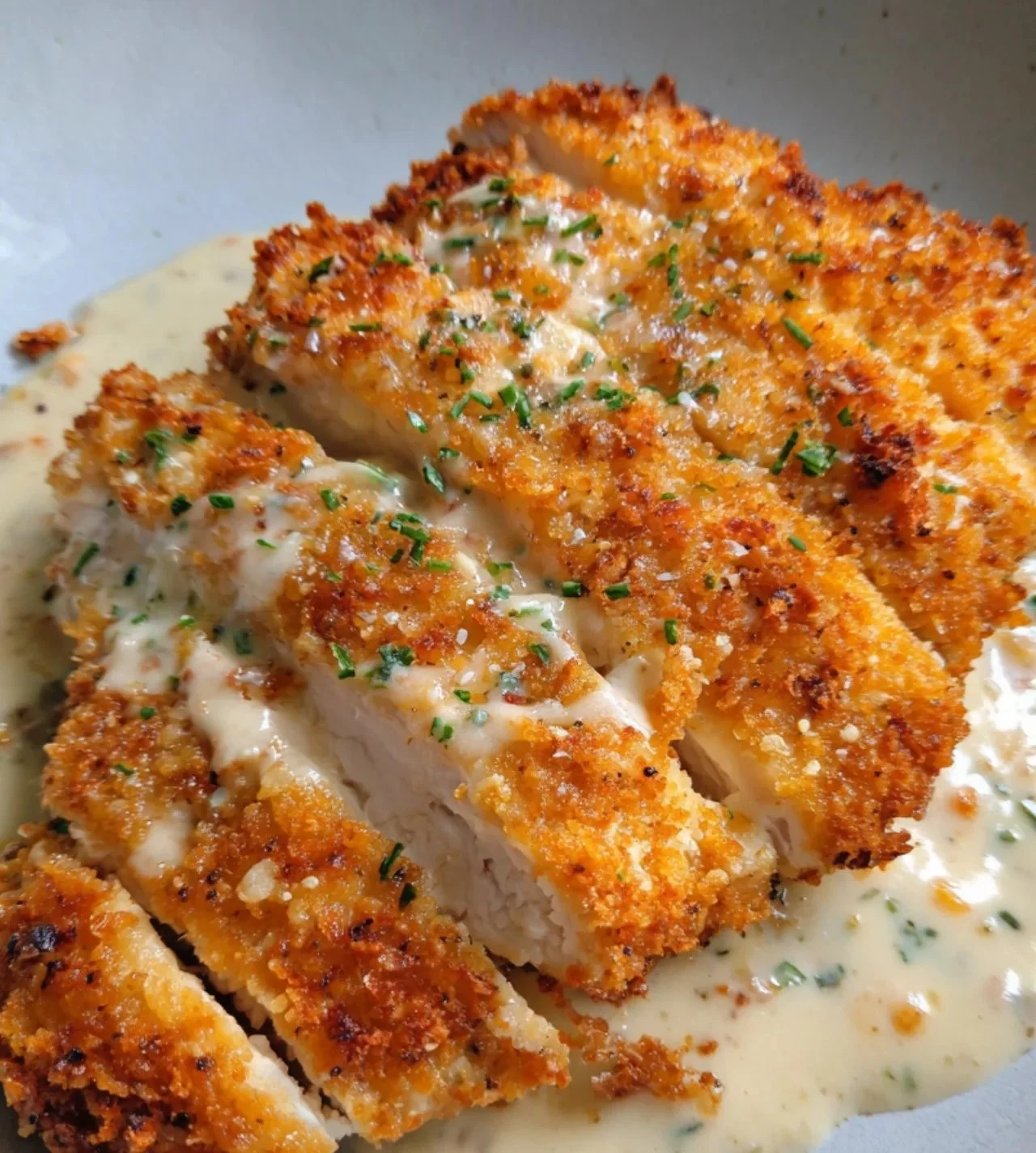 Crispy Parmesan Chicken with Creamy Garlic Sauce