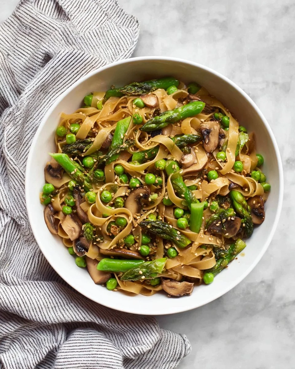 Mushroom Asparagus Stir-Fry with Noodles, vibrant and healthy dish.