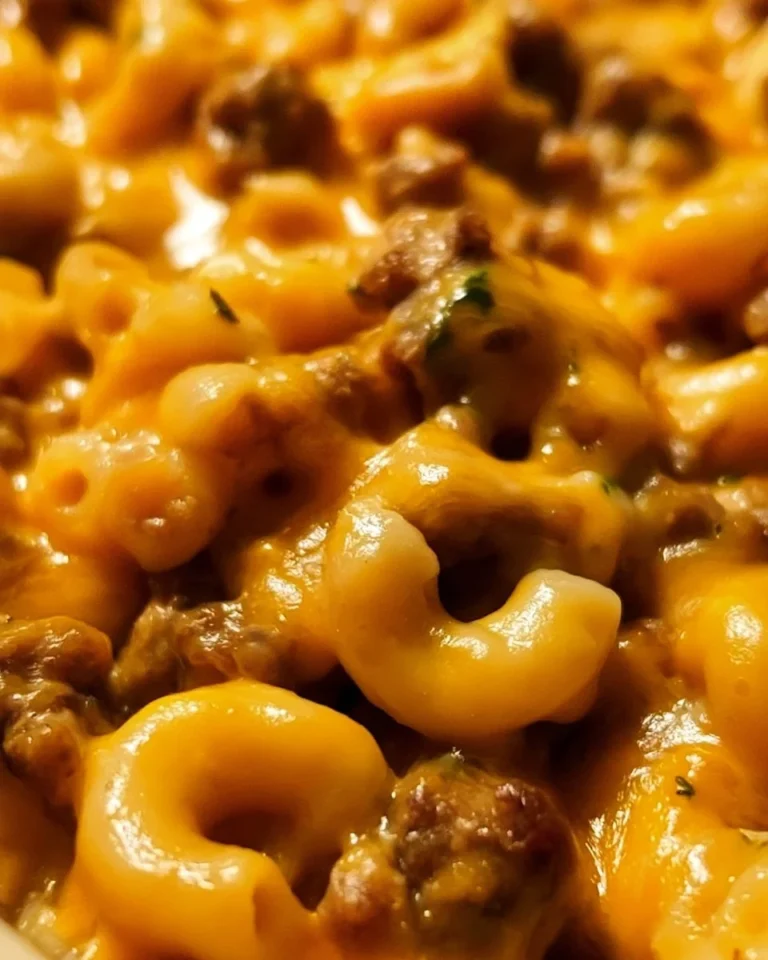 Delicious cheeseburger casserole topped with melted cheese and served in a baking dish.