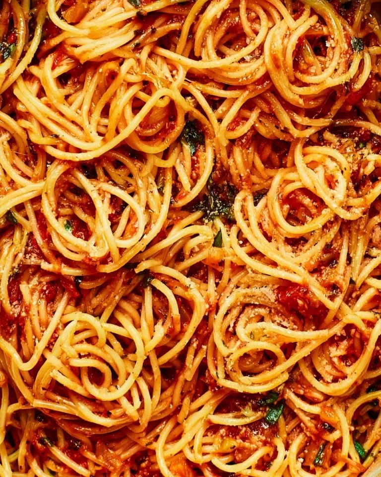 Delicious one pot pasta dish in a rustic bowl with fresh ingredients.