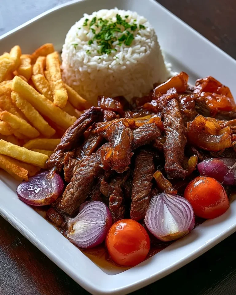 Delicious Garlic Butter Steak Bites served with fries, rice, and sautéed veggies