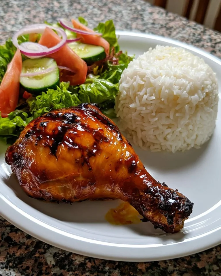Honey Garlic Roasted Chicken served with steamed rice and fresh garden salad