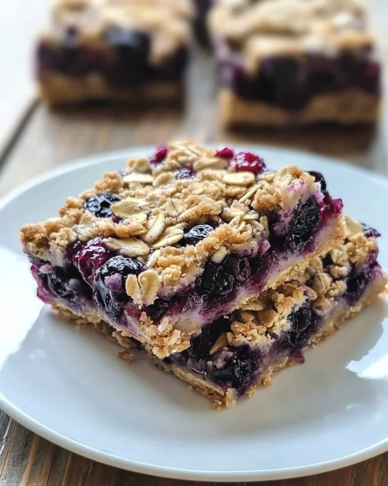 Skinny Banana Blueberry Oatmeal Crumble Bars ready to enjoy with fresh fruit.