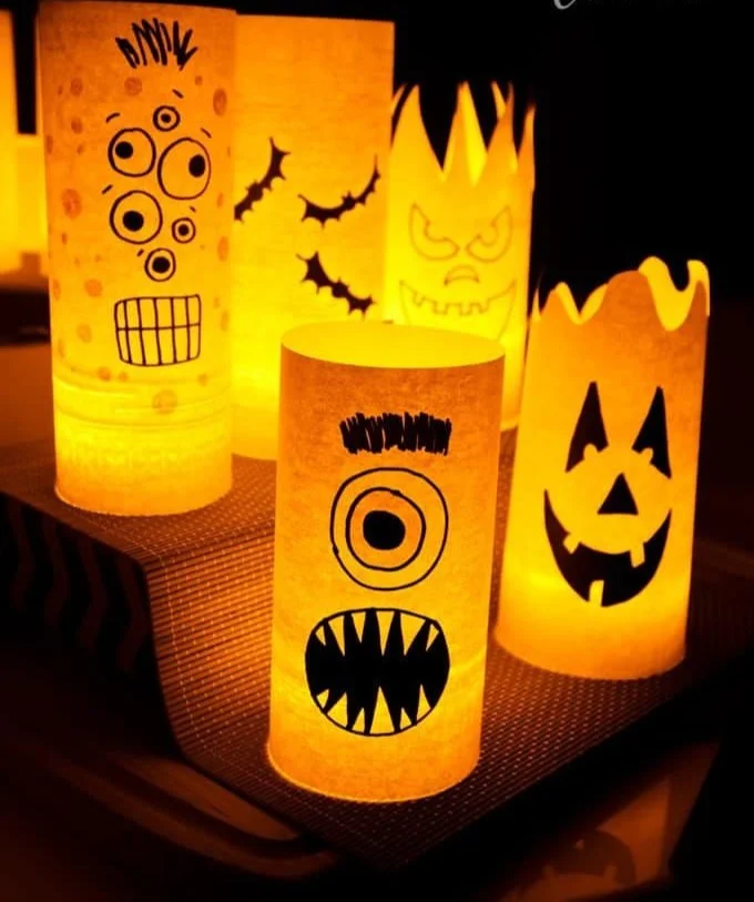 Colorful paper Halloween luminaries glowing for spooky decorations