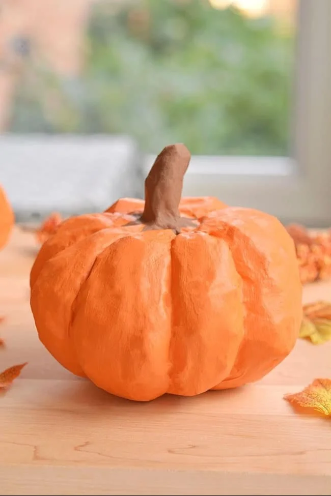 DIY paper mache pumpkin craft for fall decorations
